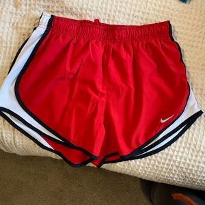 red nike shorts
